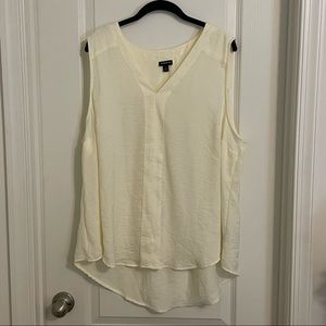 Cream flowy sleeveless blouse